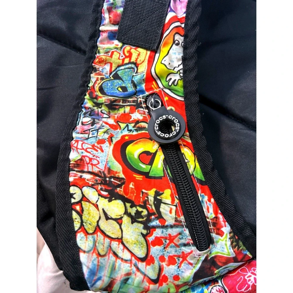 Crocs Graffiti Print Sling  Crossbody Backpack Neon Green Interior Multi-Color